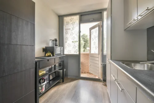 modern kitchen near dining room flat