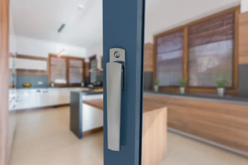 A bifold door featuring a sleek handle showcasing modern design and functionality for easy access