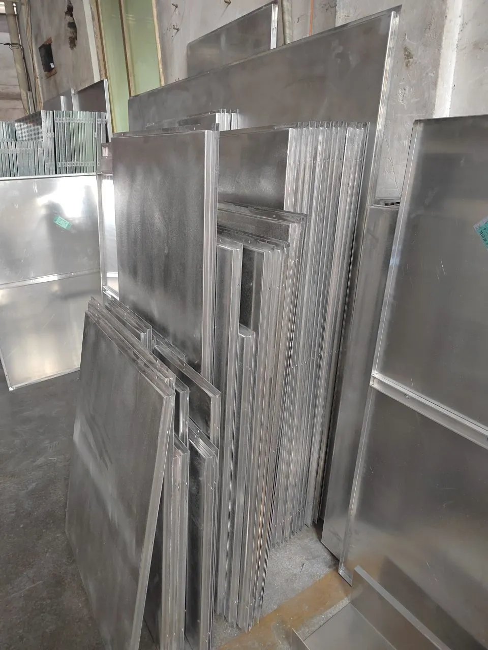 Stacks of glass panels prepared for packaging and shipping