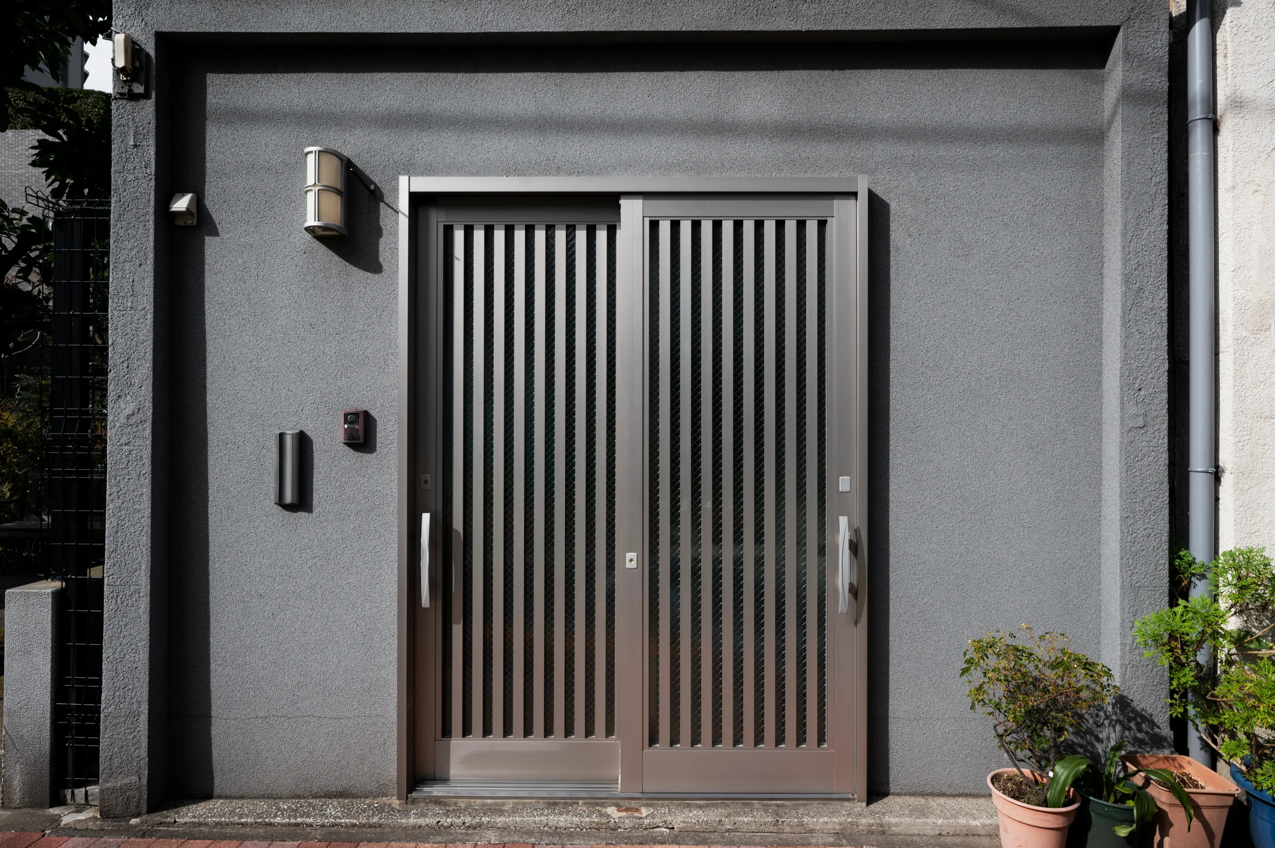 house entrance japan building with plants