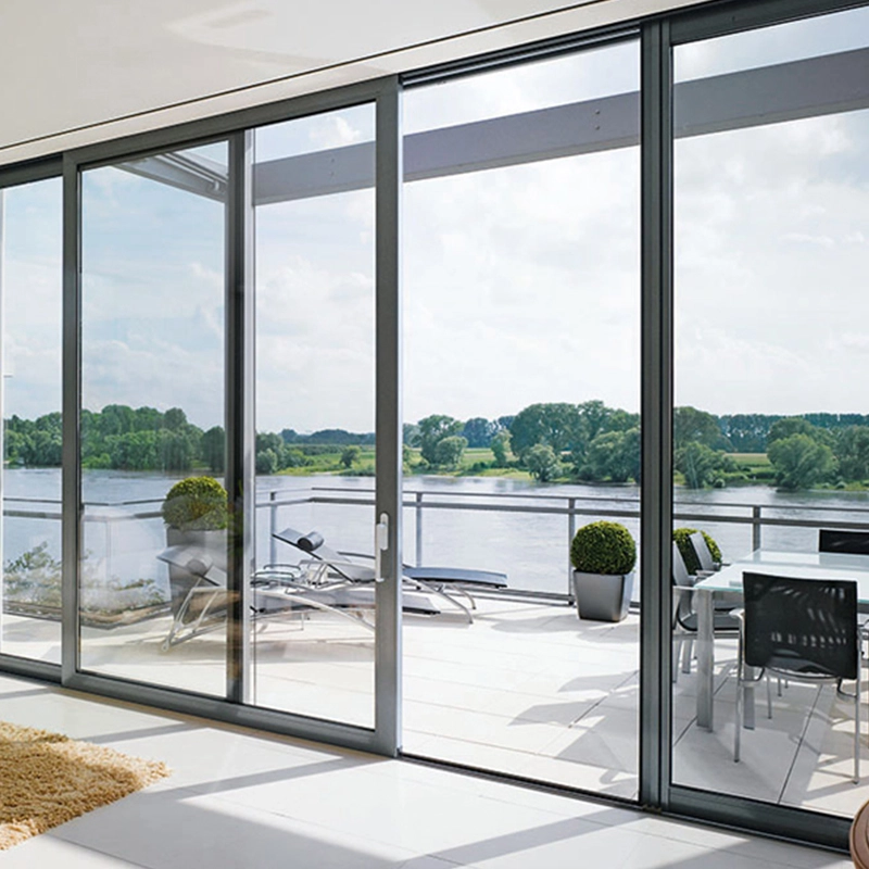 Aluminum sliding doors with glass panels facing a river