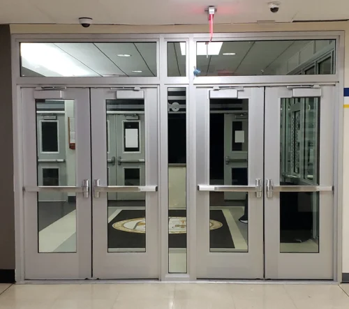 Commercial aluminum doors in a school or office hallway