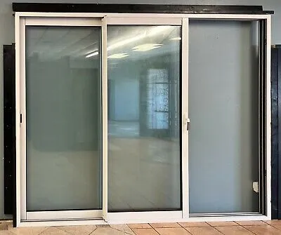 Frosted aluminum sliding door in showroom