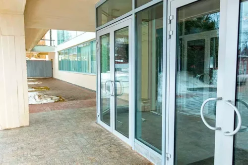 Glass and aluminum doors installed at a commercial entrance