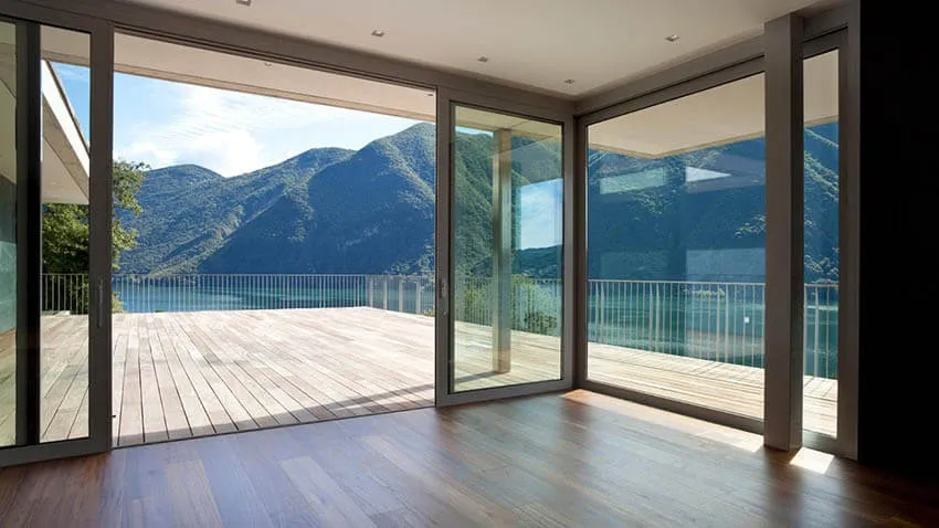 Large aluminum sliding door with scenic mountain view