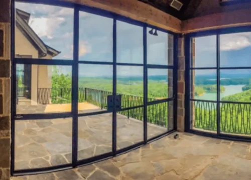 Scenic mountain view through aluminum framed glass doors