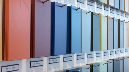 A display of various RAL color samples for aluminium doors and finishes