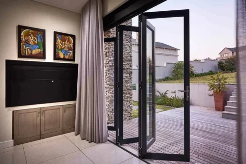 Modern bi fold door in a sunny patio setting