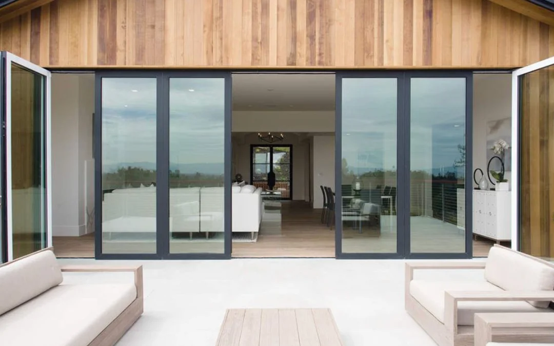 Modern glass patio doors with wooden panel exterior frame