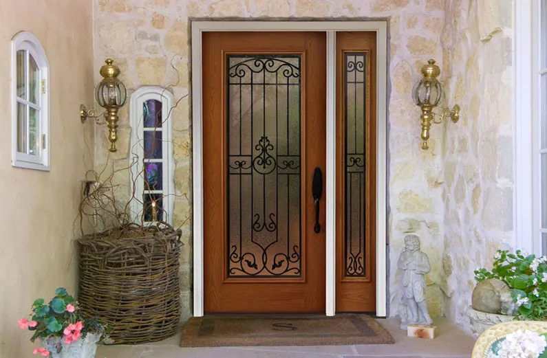 Wooden front door with decorative wrought iron detailing