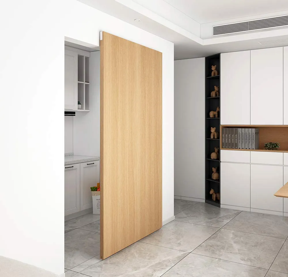 Light wood sliding door separates the kitchen from the hallway