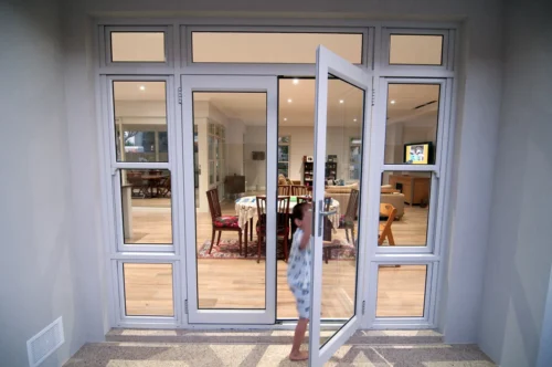 Modern aluminum door in residential setting