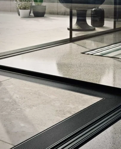 Close up of flush aluminum threshold with sleek design