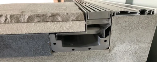 Sectional view of aluminum threshold with concealed drainage