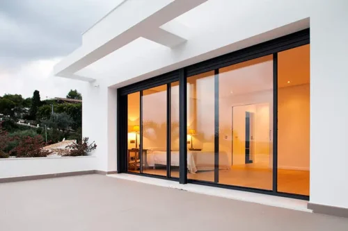 Aluminum sliding door with view of a modern interior room