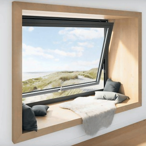 A modern pivot window with a large open space and scenic view